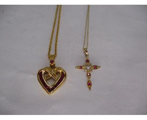 9ct Gold Ruby and Small Diamond Cross Pendant and Chain, and a Gold Plated Ruby Set Heart Shaped Pendant and Chain (2) 