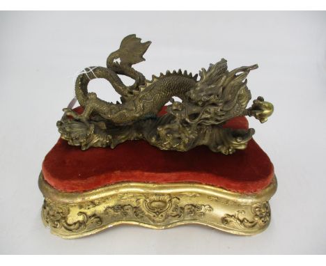 Chinese Bronze Dragon, 22cm long, on a Gilded Stand 