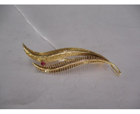 Continental Gold Floral Spray Brooch Set with a Small Ruby, 3.3g, two stamped marks on side of pin 