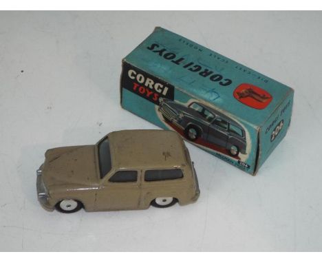 Corgi - a diecast model Hillman Husky finished in tan # 206 vg in fully intact original blue picture box