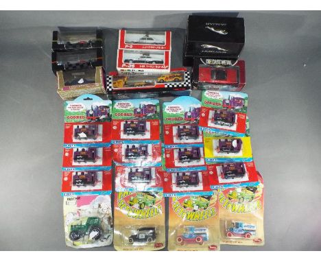 Ertl, Brumm, Diapet, Onyx and others A group of 25 boxed / carded diecast model vehicles in various scales. Lot includes Ertl