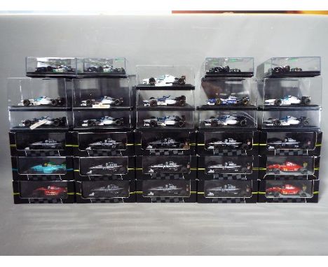 Onyx - 30 diecast model cars by Onyx from the F1 collection, models are contained in display boxes, many with outer card slee