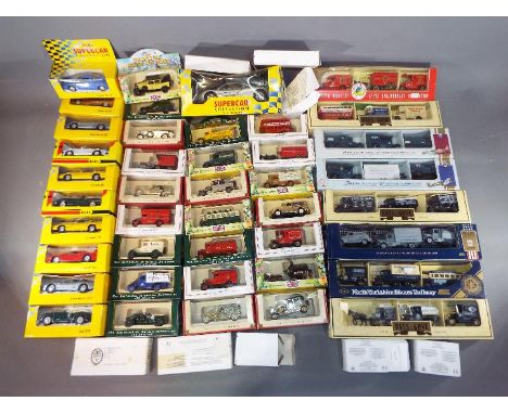 Lledo, Maisto - Approximately 50 boxed diecast model vehicles in various scales. Lot includes Maisto Supercar Collection Buga