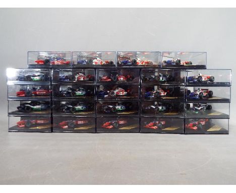 Onyx - 24 diecast model F1 cars by Onyx, models are contained in original display boxes.