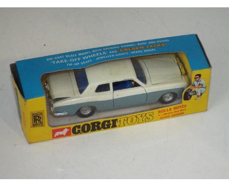 Corgi - a diecast model Rolls Royce Silver Shadow finished in pearlescent white over grey with blue interior, Golden Jacks se