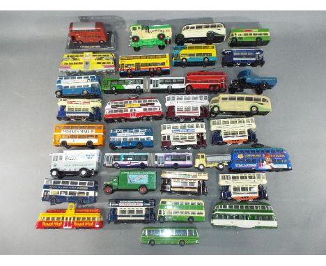 Corgi - In excess of 30 Corgi diecast model buses, trams and commercial vehicles in various scales. Lot includes Corgi Metrob
