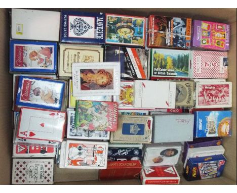 A large collection of approximately 200 vintage and retro packs of playing cards and games. Lot contains Concorde; Animal Rum