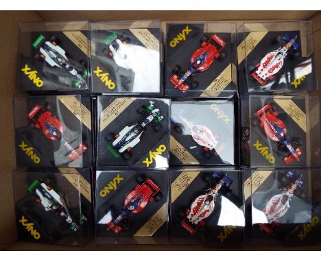 Onyx - 23 diecast model F1 racing cars with driver figures in square rigid transparent cases, mint 