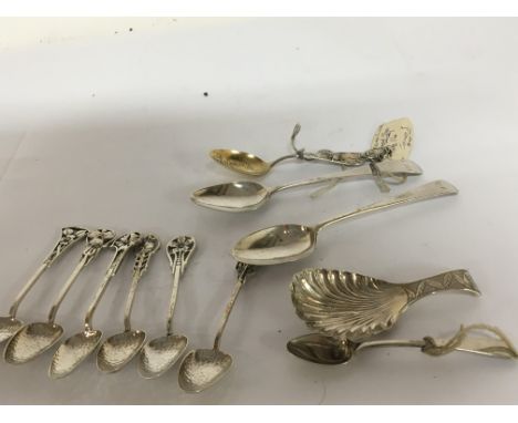 A set of six Art Nouveau silver coffee spoons a tea caddy spoon and other George III silver tea spoons.