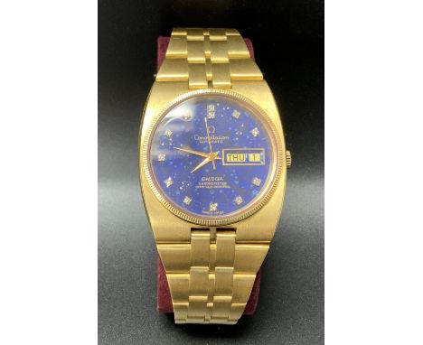 An 18ct yellow gold Constellation Automatic Omega Chronometer day date wrist watch with Stardust (Lapis Lazuli) and Diamond s