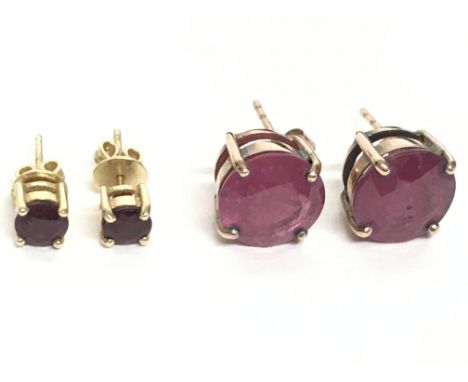 Two pairs of 9 carat gold Ruby set earrings. Overall weight 4.6g. Postage category A