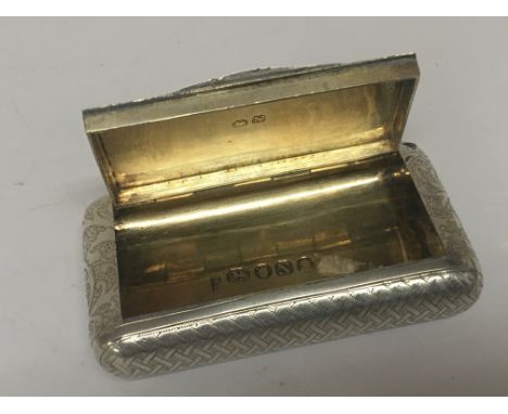 A Quality George III silver snuff box parcel gilt decoration with a patterned surface London 1808 hallmarks. 6.5cm long. nice