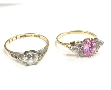 Two 9 carat rings set with gemstones. Sizes M & K. 2.9g Postage category a