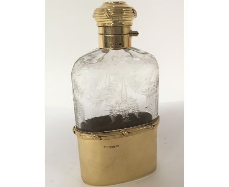 An Exceptional Quality 18carat gold and wheel etched glass George V hip flask date 1919. One of the finest hip flasks to be s