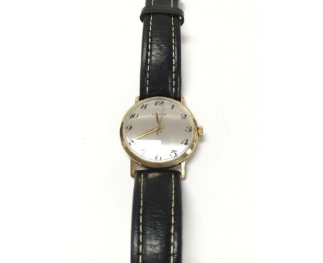A 9ct gents Tissot wrist watch.