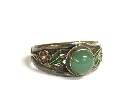 A Chinese style enamel and jade silver ring, adjustable size