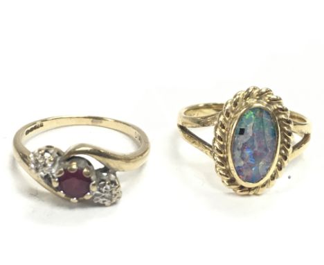 Ladies rings including an 18 carat gold ring set with an opal stone (3.6g ) & a 9 carat gold ring set with a ruby and diamond