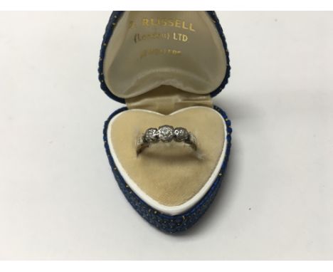 An 18ct gold diamond set ring. Size K.