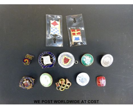 A selection of enamel badges including examples from University College Wales, Portsmouth Polytechnic, Brondesbury College an