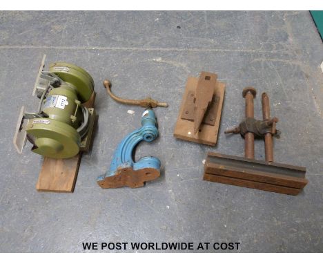 A Winmax bench grinder together with an Ornstin press, a small anvil and a marking out or similar block
