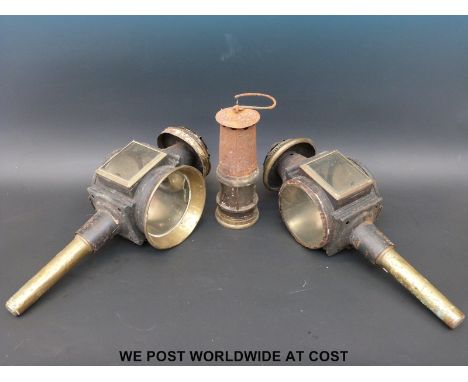 A pair of coaching lamps and a mining lamp