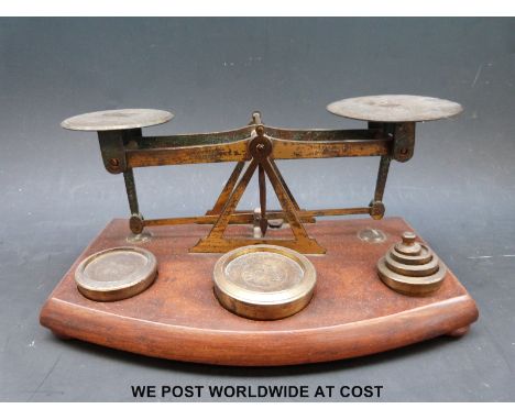 A set of TJ & J Smith Victorian postage scales with weights to base