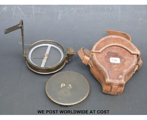 A large Stanley brass sighting compass in leather case, diameter approximately 9cm