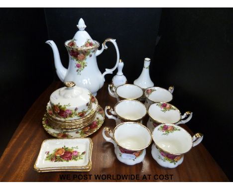 A collection of Royal Albert "Old Country Roses" comprising coffee pot, six cups and saucers, butter dish, two small dishes, 