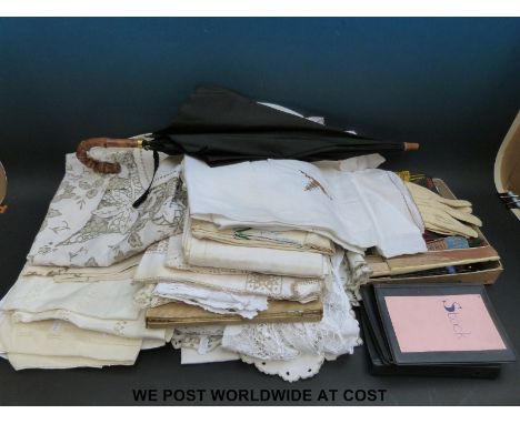 A collection of textiles to include kid gloves, Agnes Pascal silk scarf, Swiss linen handkerchiefs, collar stays, vintage fan