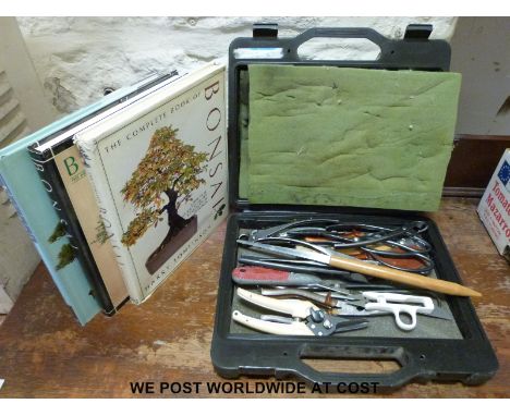 A quantity of bonsai tools. 