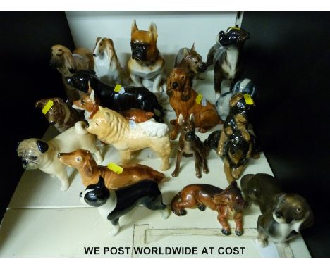 Eighteen various ceramic dogs to including Coalport spaniel, Russian ceramic collie, Goebel corgi etc and rare Lomonosov/USSR