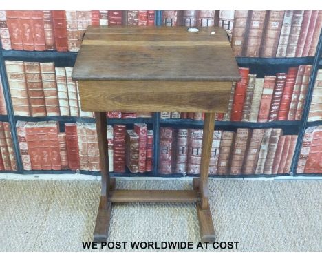 An oak school desk complete with ceramic inkwell c1900 (H80 x W56  x D46cm)