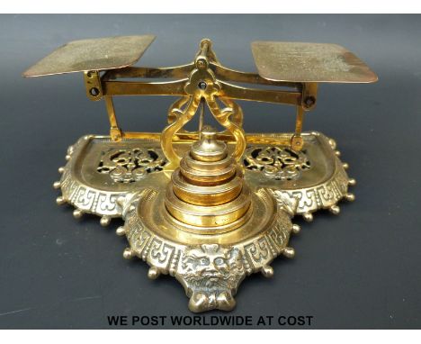 A Townsend & Co brass letter scale with cast base and weights to front marked to underside with makers mark and Rd No. 100795