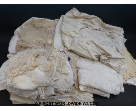 A quantity of textiles including lace 
