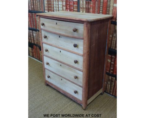 An elm and pine chest of five drawers, the top drawer bow fronted (H105 x W81 x D48cms)
