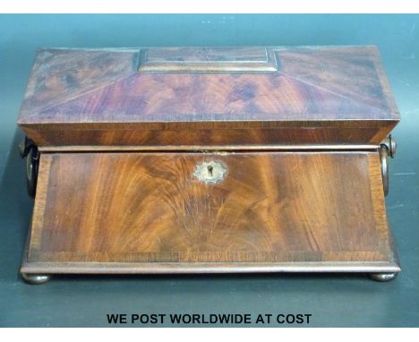 A 19thC flame mahogany rosewood sarcophagus tea caddy