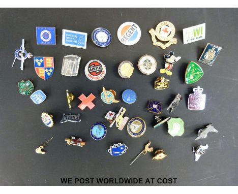 A selection of enamel badges including examples from WVS, SAAB, Association of Yorkshire Countrymen and Mickey Mouse