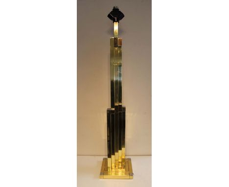 A CHROME AND GILT STANDARD LAMP, 1970s, BY LUMICA, 135cm (h) (excluding shade), stamped.
