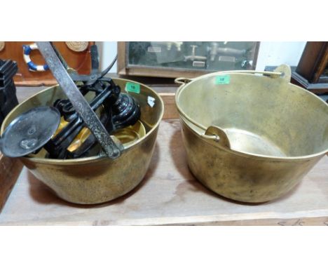 Two brass preserving pans and a set of kitchen scales