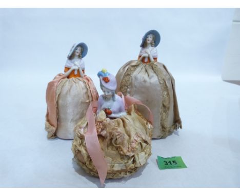 Three early 20th century pin cushion dolls. German