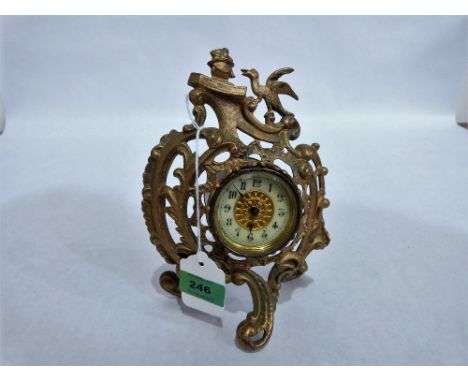 A French rococo revival gilt speltar mantle clock with drum movement (running). 8½'' high