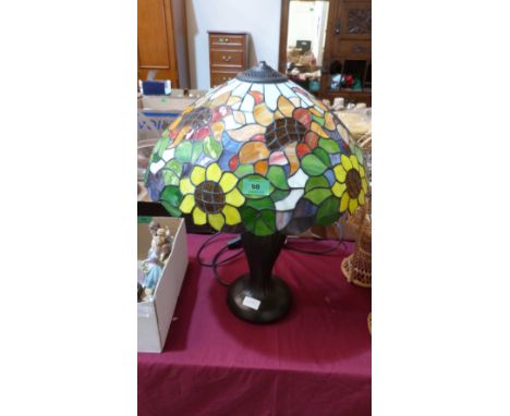 A Tiffany style table lamp with stained glass shade