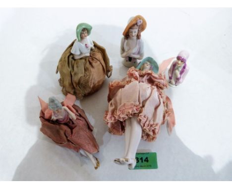Five early 20th century pin cushion dolls. German
