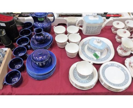 A Royal Worcester 'Counterpoint' tea service of 21 pieces and a blue glazed part service