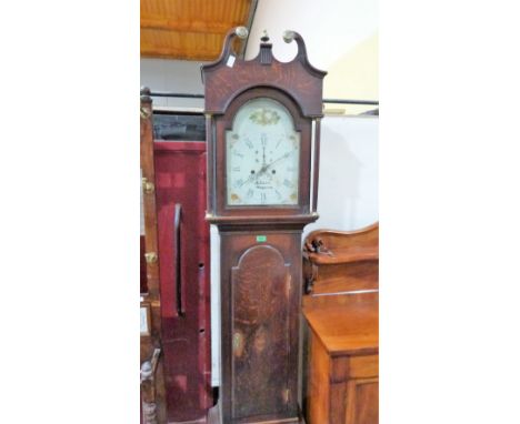 An early 19th century oak longcase clock, 8 day movement, the hood with broken swan neck pediment, the painted dial signed N.