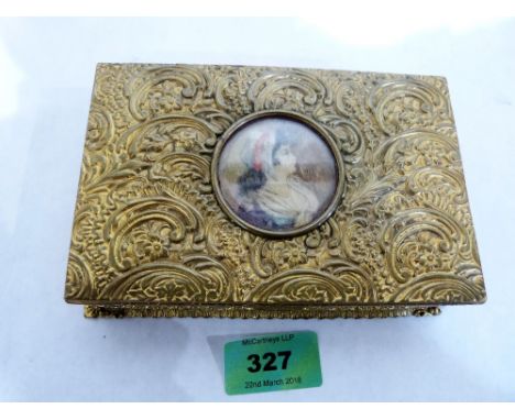 A gilt metal box, the lid with inset portrait miniature, the base inscribed Aron Bros, London. 6'' wide