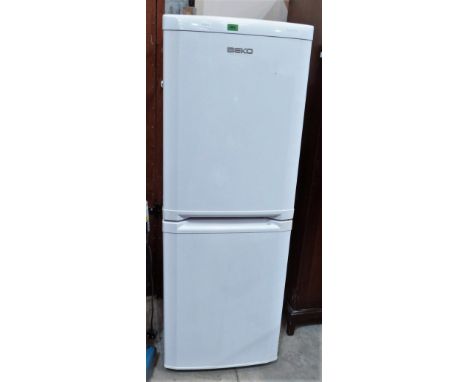 A Beko frost free fridge-freezer finished in white enamel
