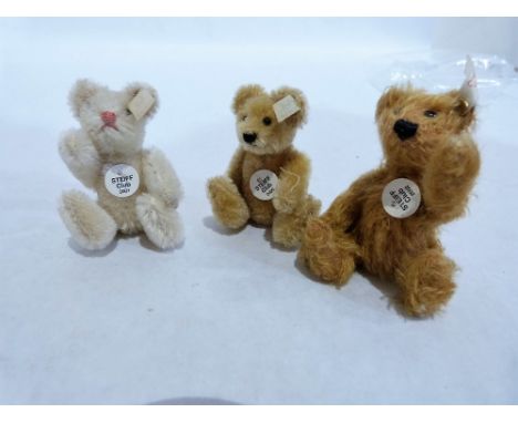 Steiff miniature teddy bears. Set of 3: dark tan mohair club year 2002, white with pink nose club year 2001, tan club year 20
