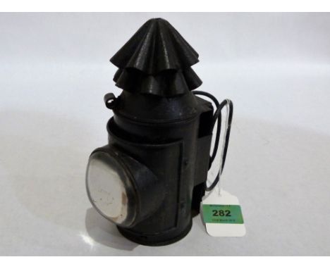 A railwayman's lamp. 7½'' high. Burner lacking