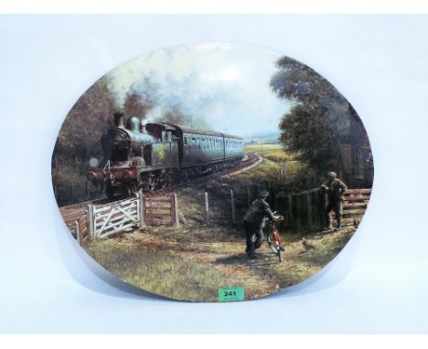 A tole style metal plaque decorated with a railway scene. 19½'' wide